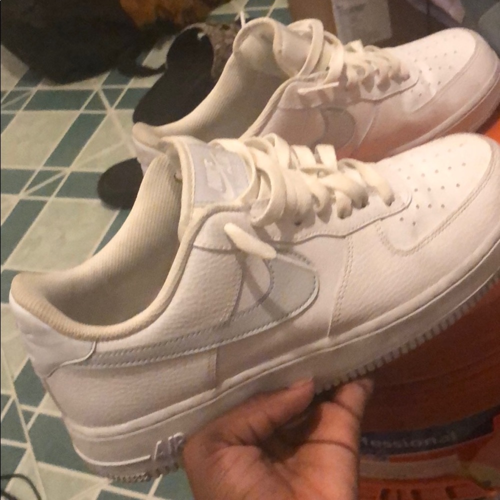 Air Force 1’s with gray Nike sign